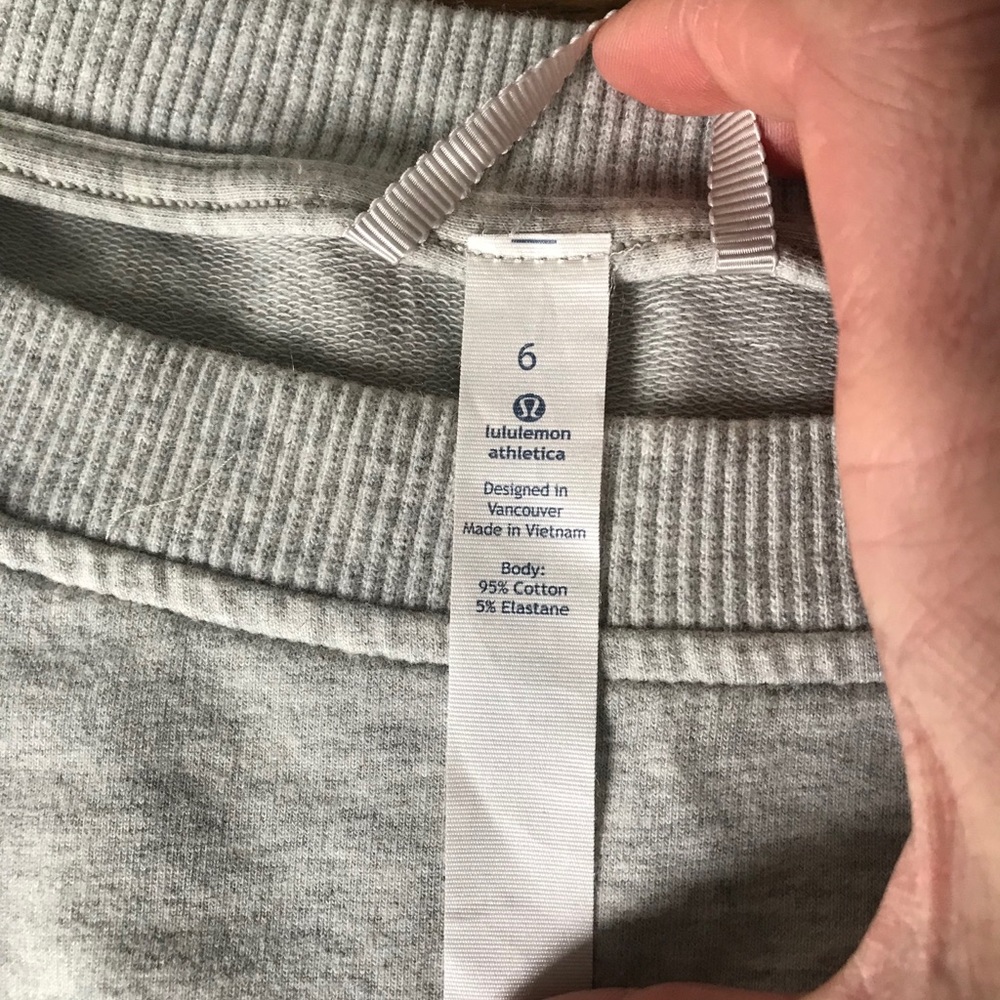 LuLulemon split short sleeved grey shirt